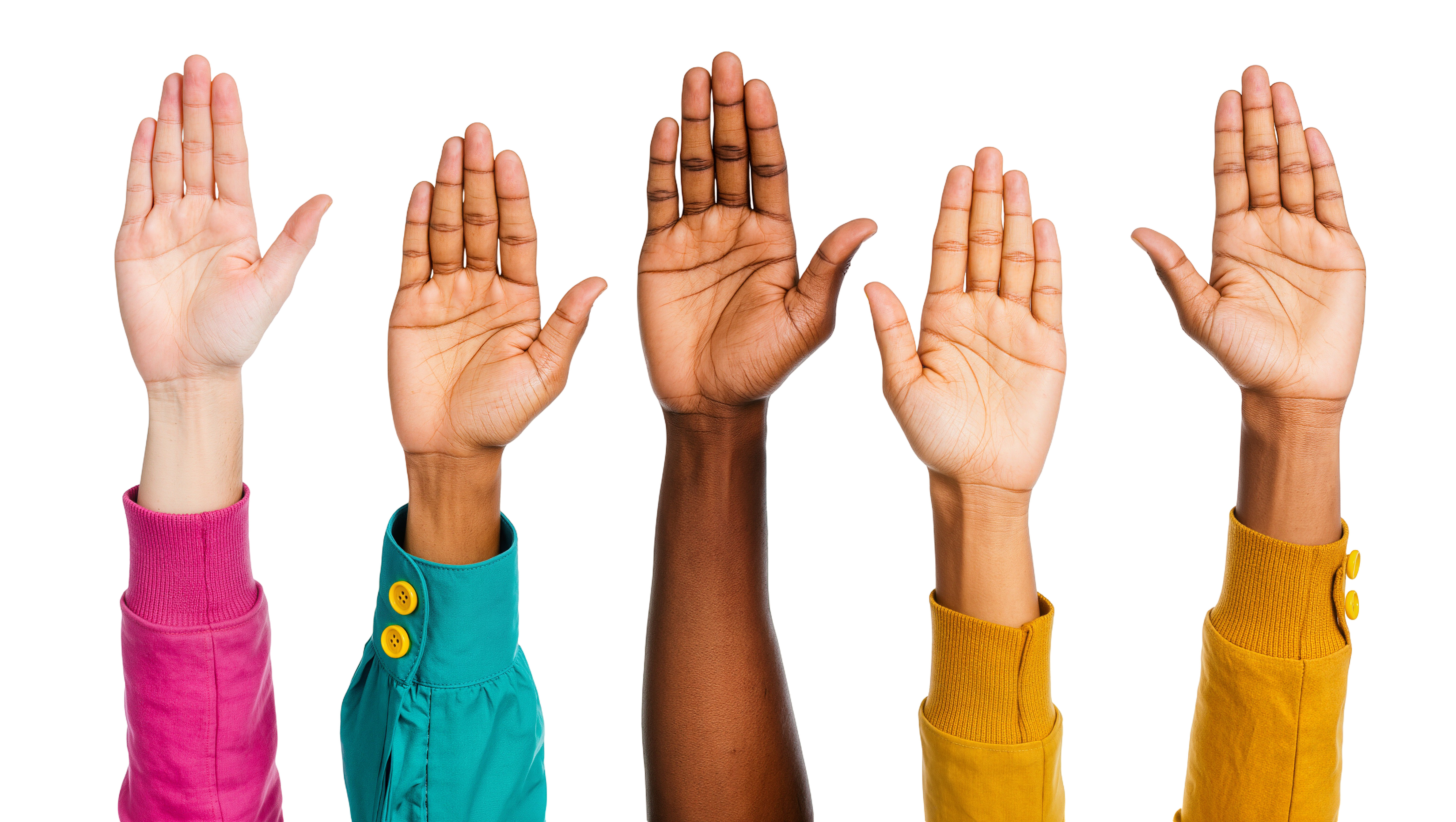 Women raising hands to show their skin tone