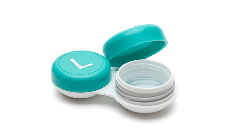 Photo of contact lens container with lid open.