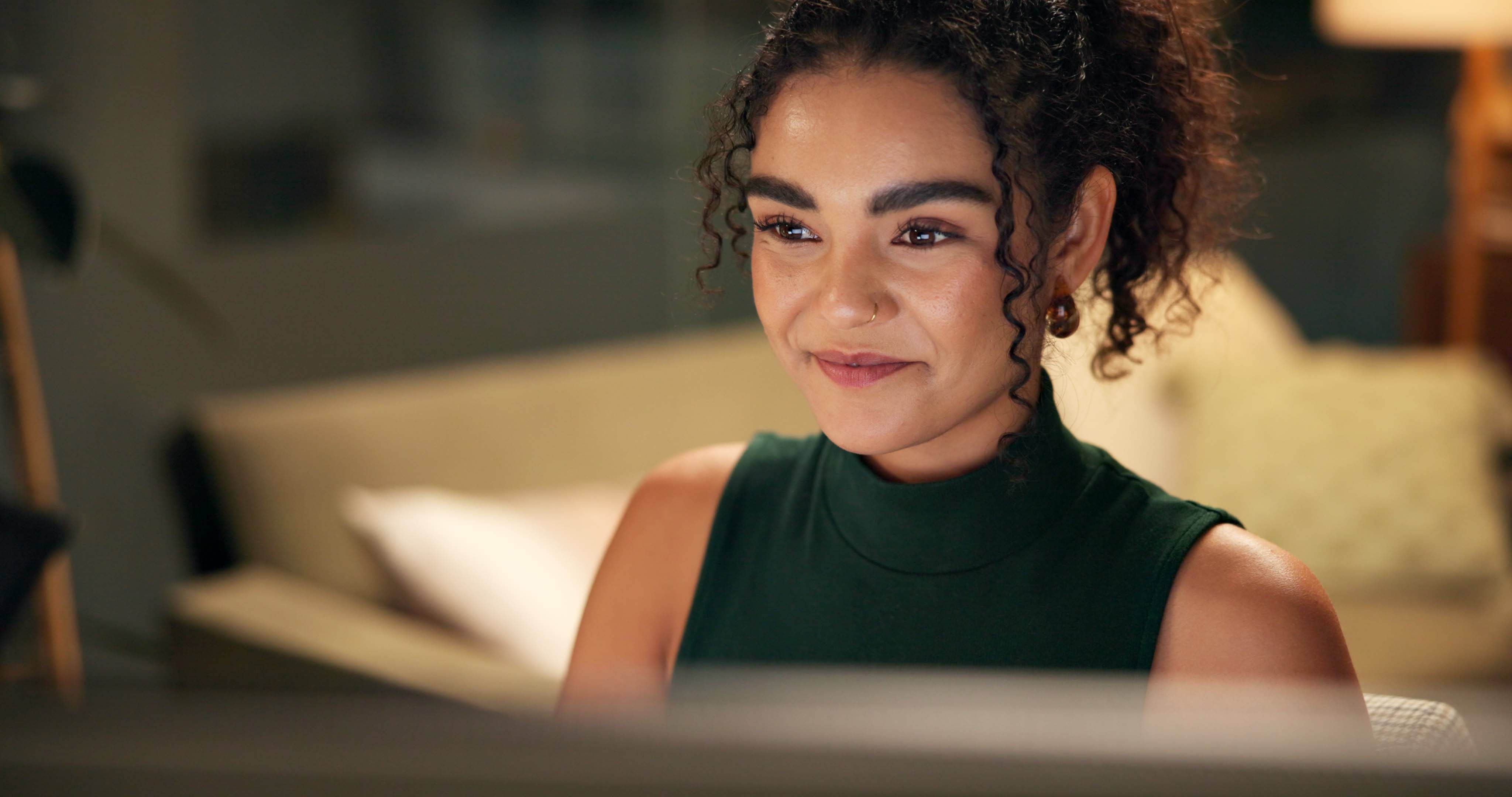 Woman working in the office at night.