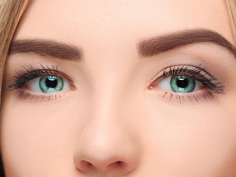 A picture of a womans blue eyes close up