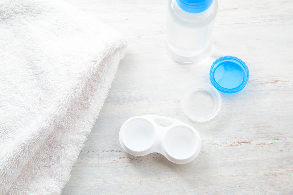 illustration of small contact lens case on countertop