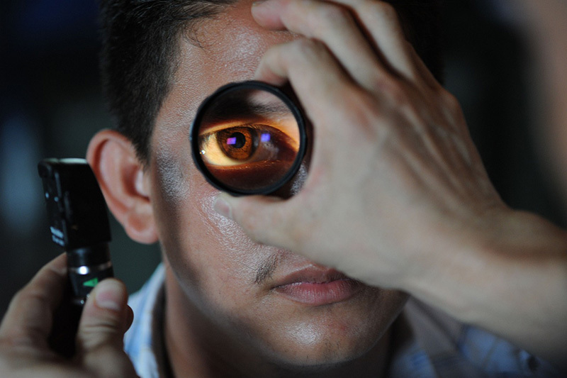 an image of a man getting an eye examination